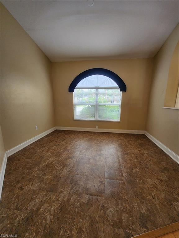 12796 Vista Pine Circle Fort Myers, FL 33913 - Photo 5 of 25 an empty room with a empty space and windows