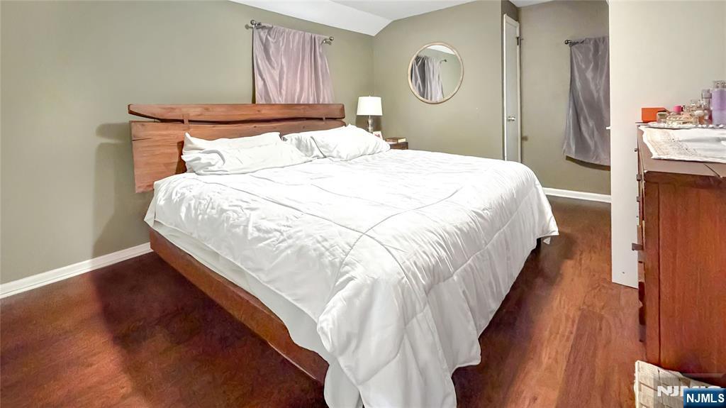 154 Charlton Avenue, Unit 2 Lodi, NJ 07644 - Photo 10 of 14 a bedroom with bed and window