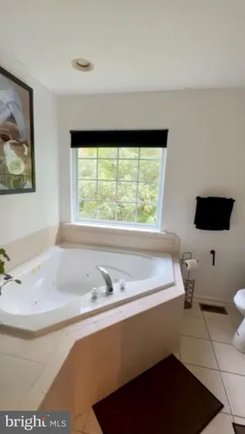 a bathroom with a sink and a bathtub
