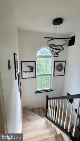 a bedroom with furniture and window