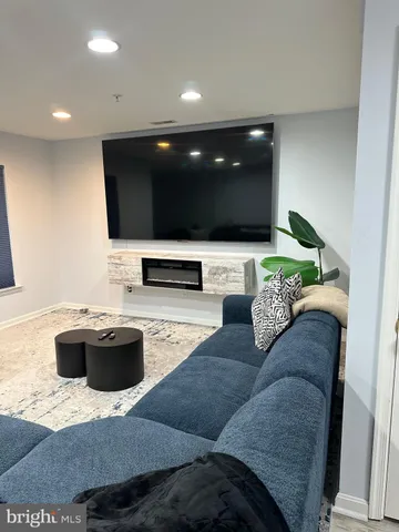 a living room with furniture and a couch