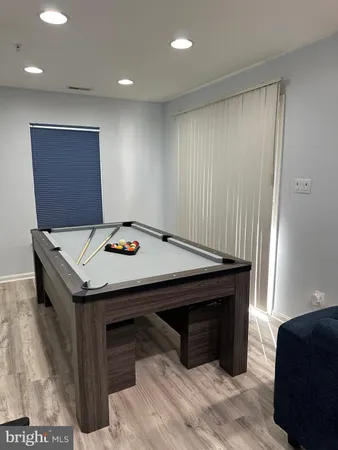 a kitchen with a table and chairs