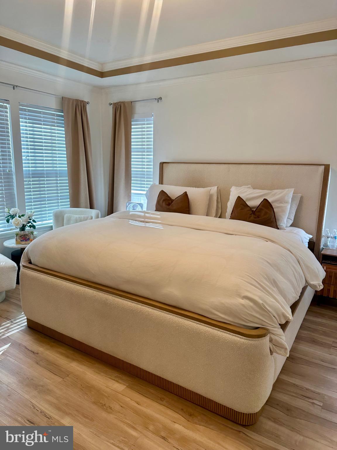 1701 Waltman Road Edgewood, MD 21040 - Photo 5 of 25 a large bed sitting in a bedroom next to a window