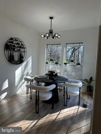 a workspace with furniture and window