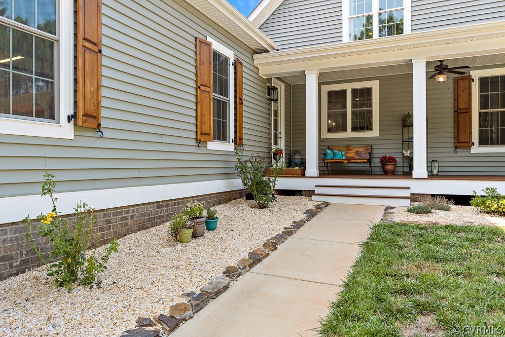 3033 Millmount Lane Powhatan, VA 23139 - Photo 2 of 49 a front view of a house with a yard