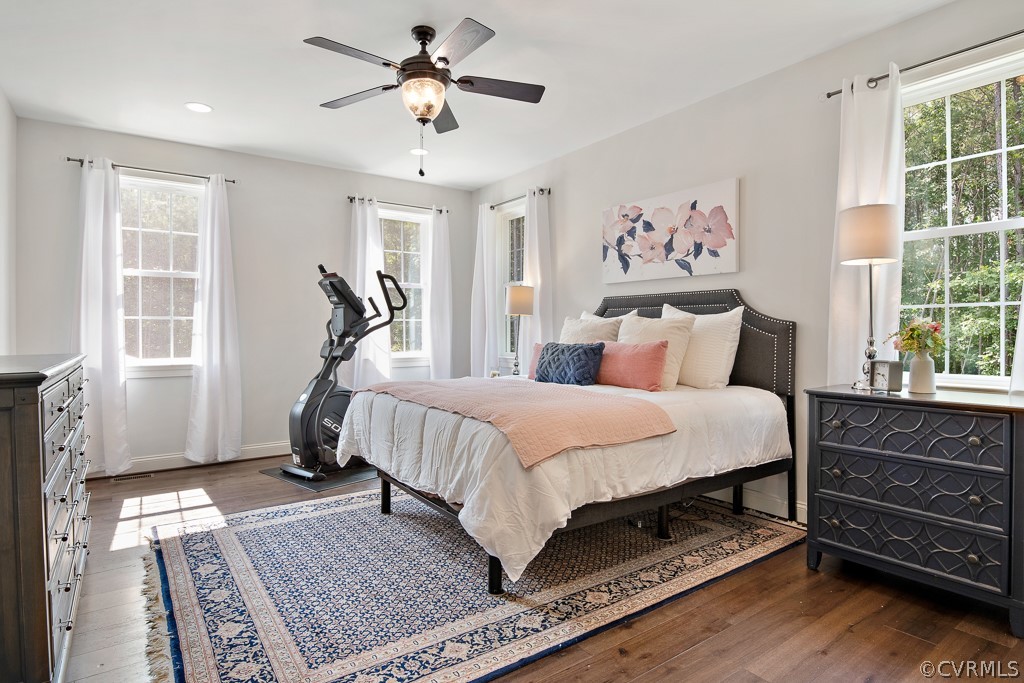 3033 Millmount Lane Powhatan, VA 23139 - Photo 26 of 49 a bedroom with a bed and wooden floor