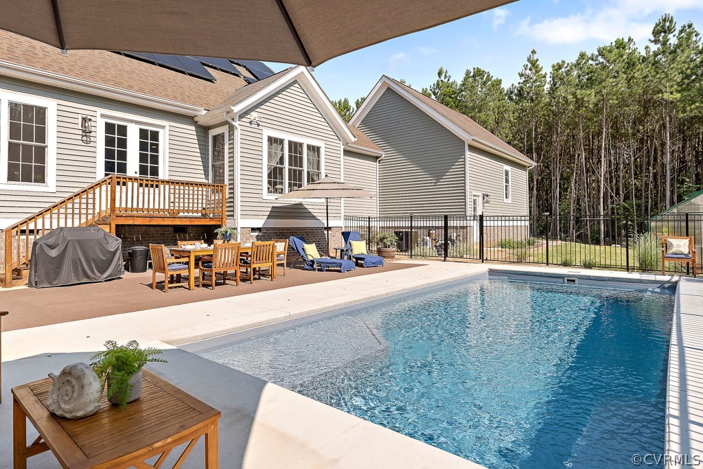 3033 Millmount Lane Powhatan, VA 23139 - Photo 44 of 49 a view of a house with swimming pool in front of it