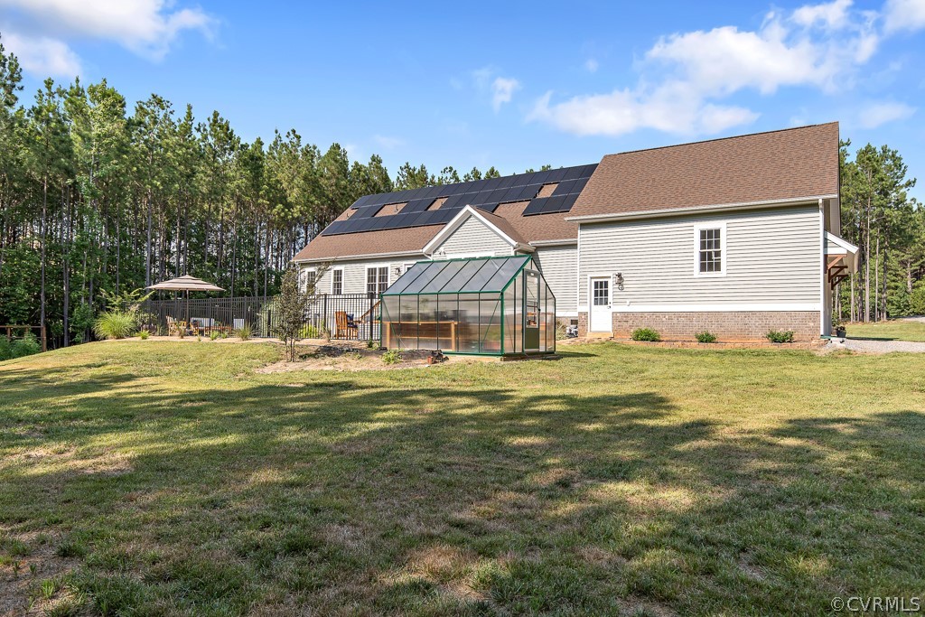 3033 Millmount Lane Powhatan, VA 23139 - Photo 46 of 49 a front view of a house with a big yard