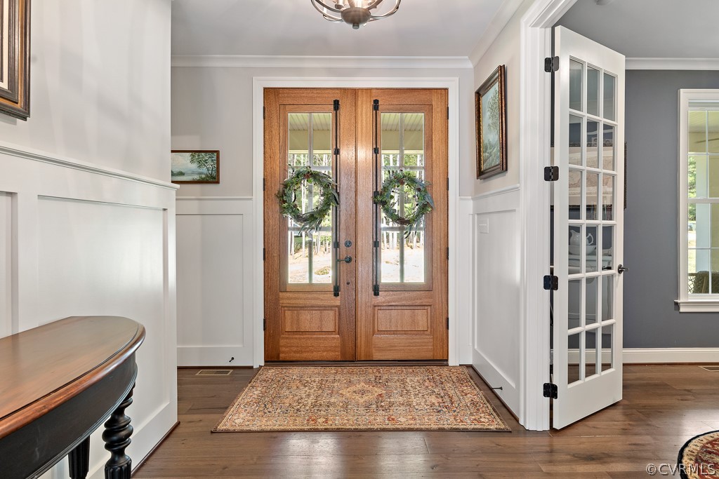 3033 Millmount Lane Powhatan, VA 23139 - Photo 6 of 49 a view of a hallway with windows and cabinet