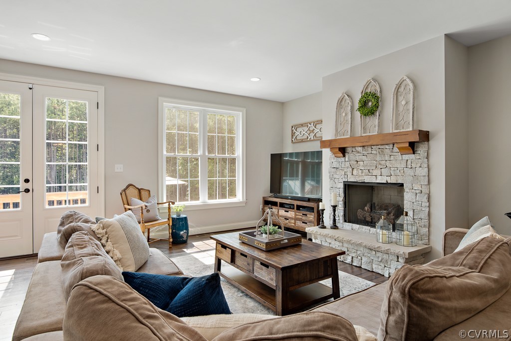 3033 Millmount Lane Powhatan, VA 23139 - Photo 10 of 49 a living room with furniture and a fireplace