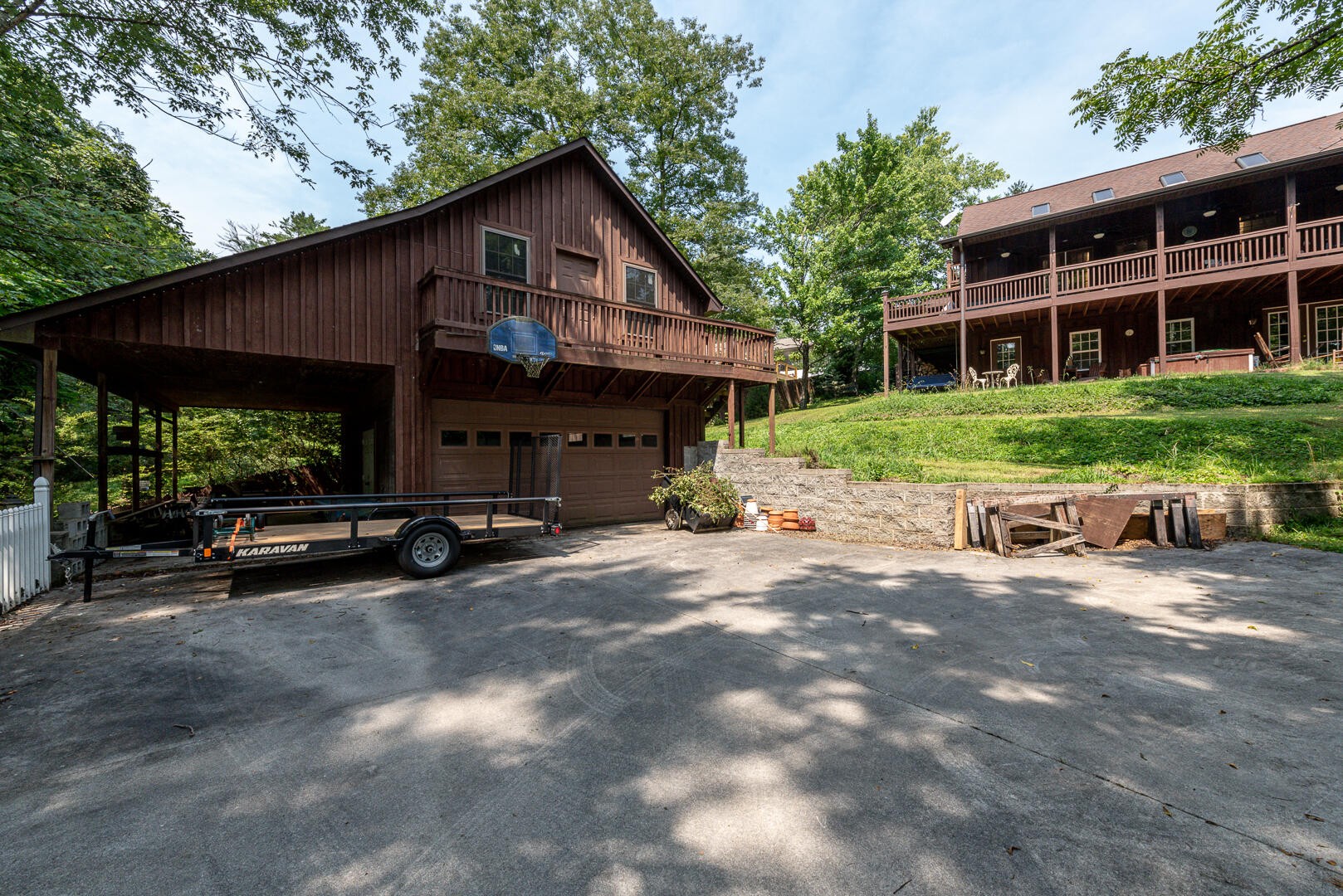 511 Delaware Avenue Oak Ridge, TN 37830 - Photo 18 of 37 a view of a house with a yard and sitting area