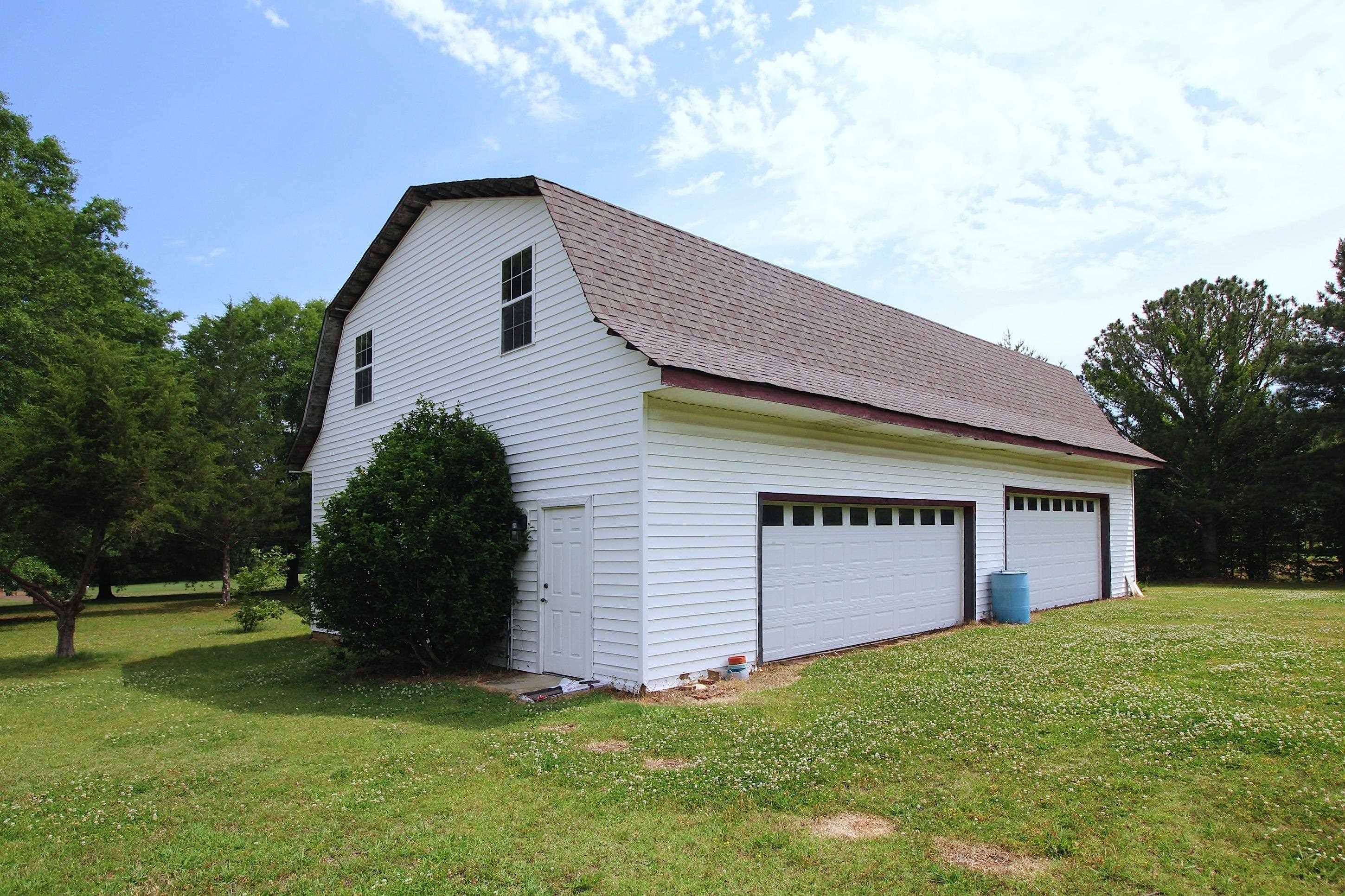 2550 North Reid Hooker Road Eads, TN 38028 - Photo 30 of 32 a front view of a house with a yard