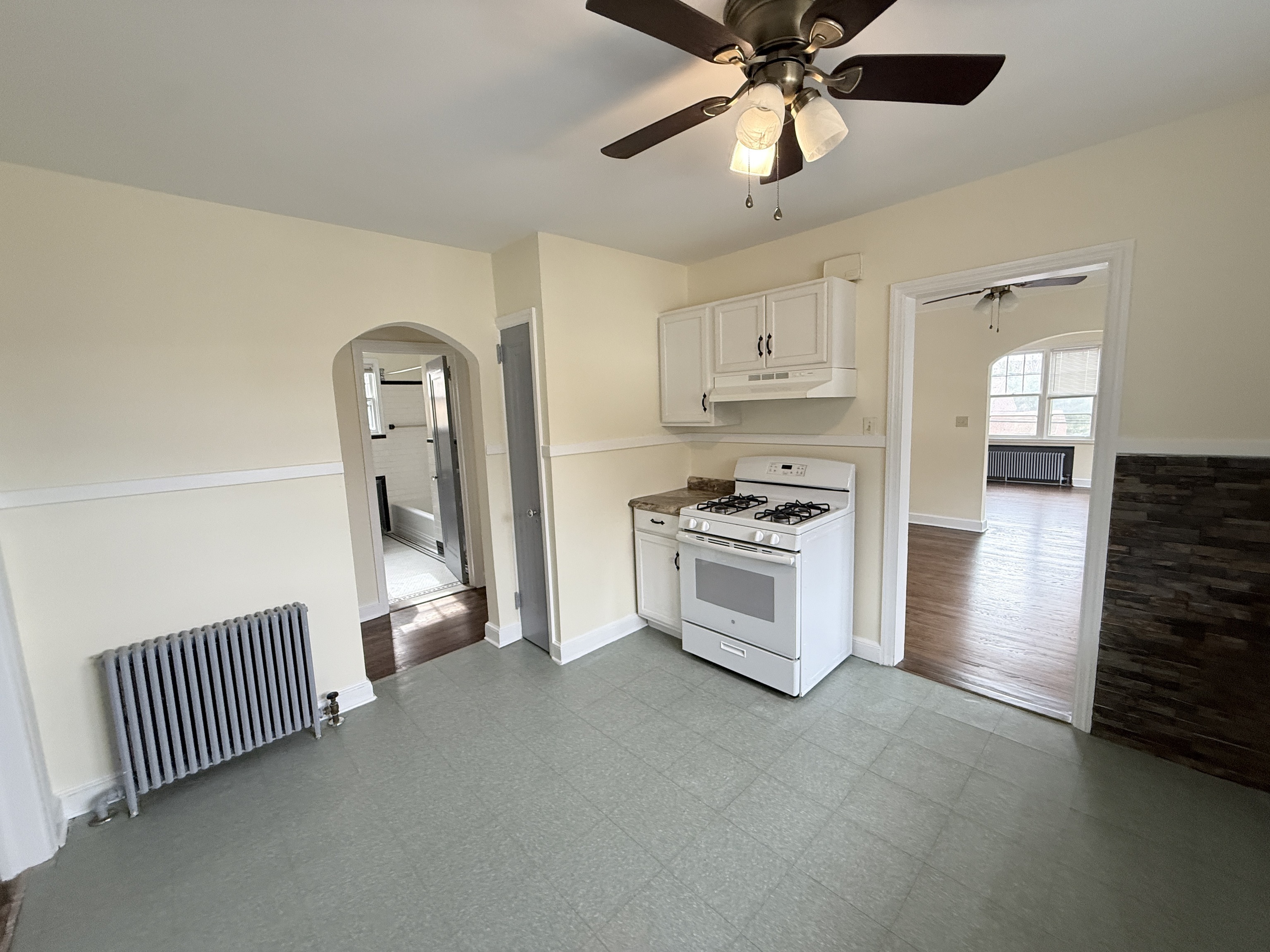 89 Hillside Avenue Torrington, CT 06790 - Photo 12 of 17 a view of kitchen with sink microwave and cabinets