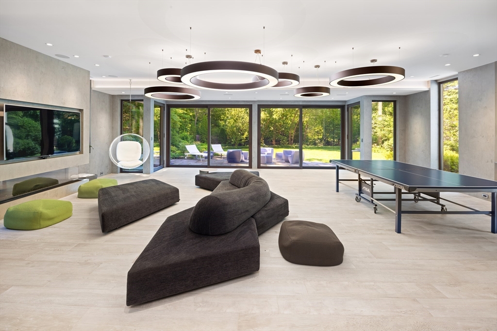 10 Spooner Road Brookline, MA 02467 - Photo 15 of 26 a large bedroom with bed and a large window