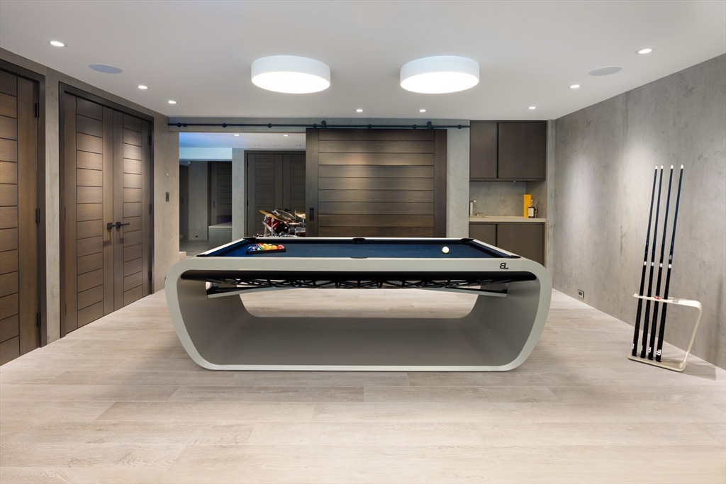 10 Spooner Road Brookline, MA 02467 - Photo 17 of 26 a room with wooden floor