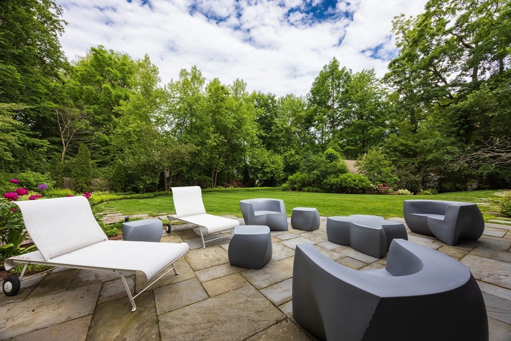 10 Spooner Road Brookline, MA 02467 - Photo 19 of 26 a view of outdoor sitting area with furniture and garden