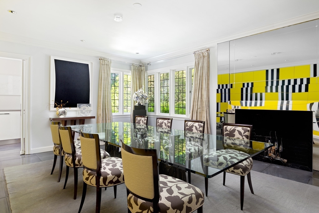 10 Spooner Road Brookline, MA 02467 - Photo 4 of 26 a living room with furniture and a flat screen tv