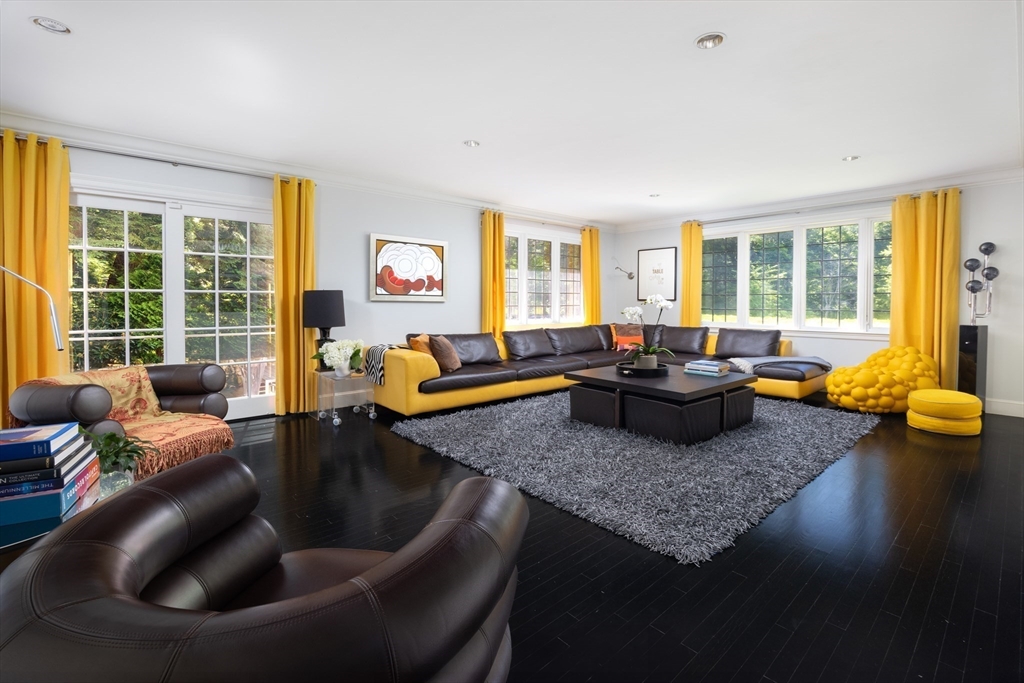 10 Spooner Road Brookline, MA 02467 - Photo 6 of 26 a living room with furniture and a table