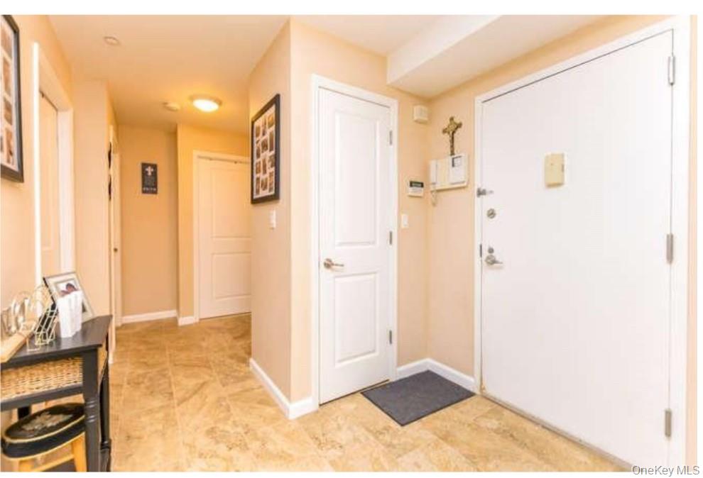 1490 Outlook Avenue, Unit 1A Bronx, NY 10465 - Photo 2 of 12 Foyer with baseboards