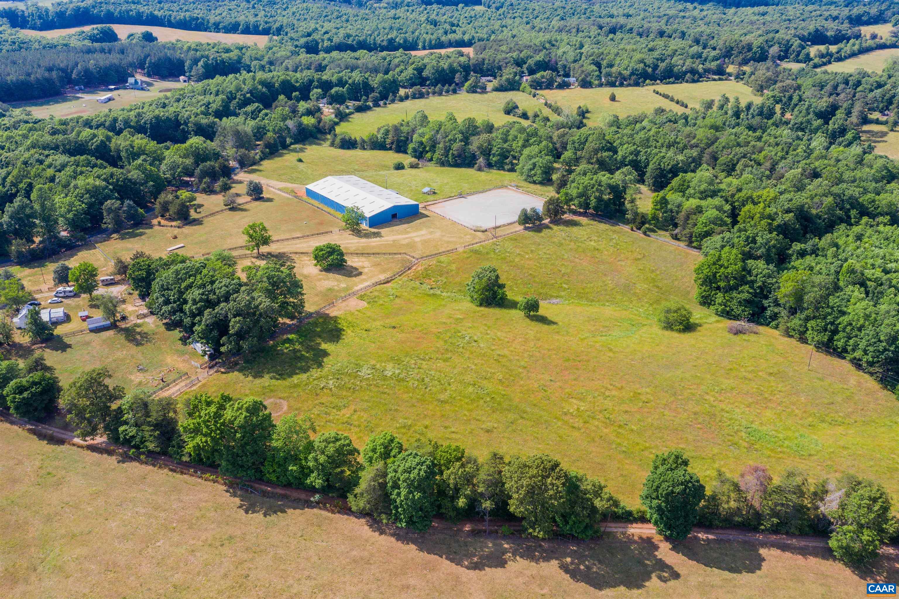 39 Dunsford Lane Dillwyn, VA 23936 - Photo 55 of 75 a view of a lake with a yard