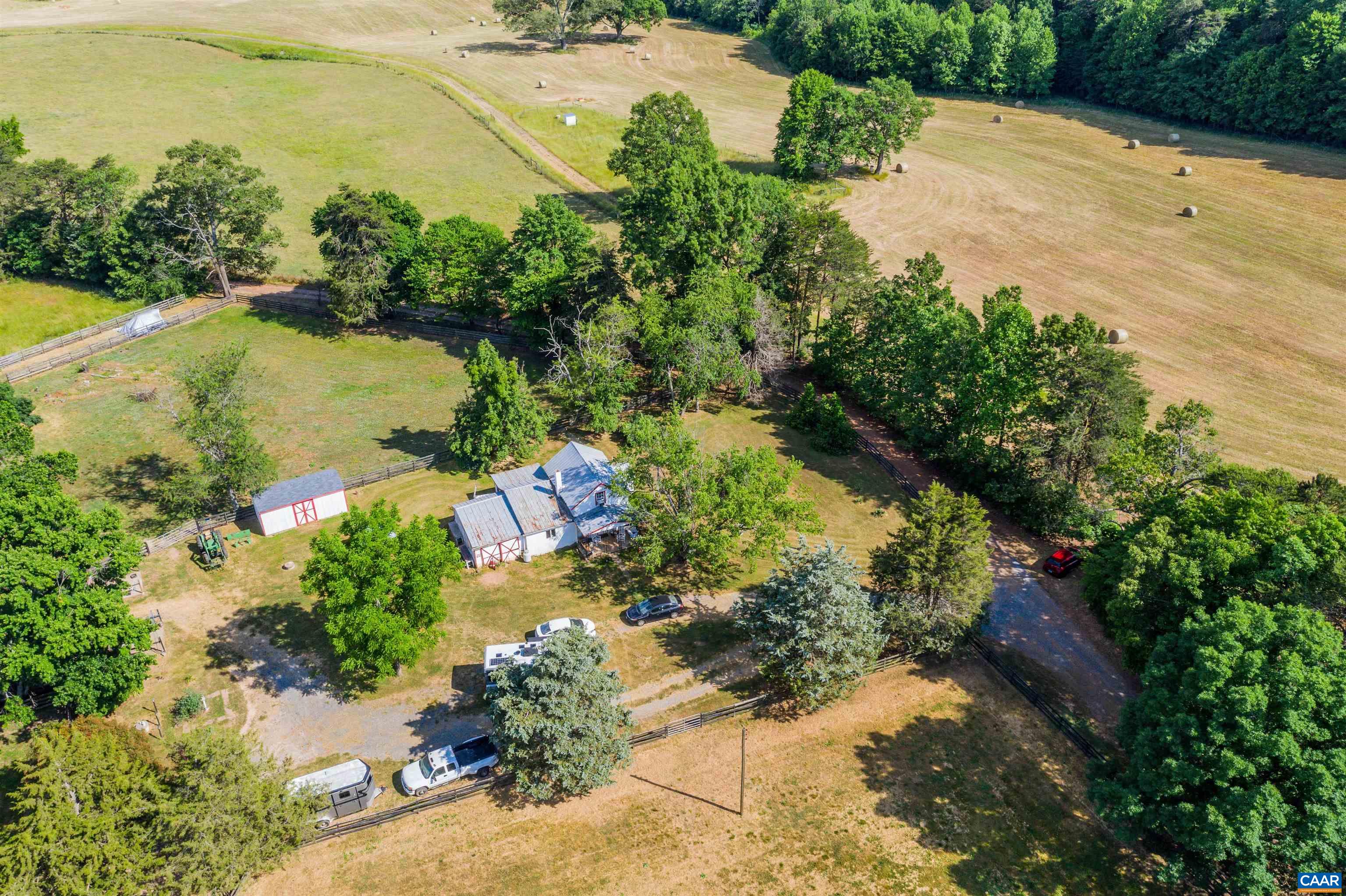 39 Dunsford Lane Dillwyn, VA 23936 - Photo 68 of 75 an aerial view of ocean beach and residential house with trees all around