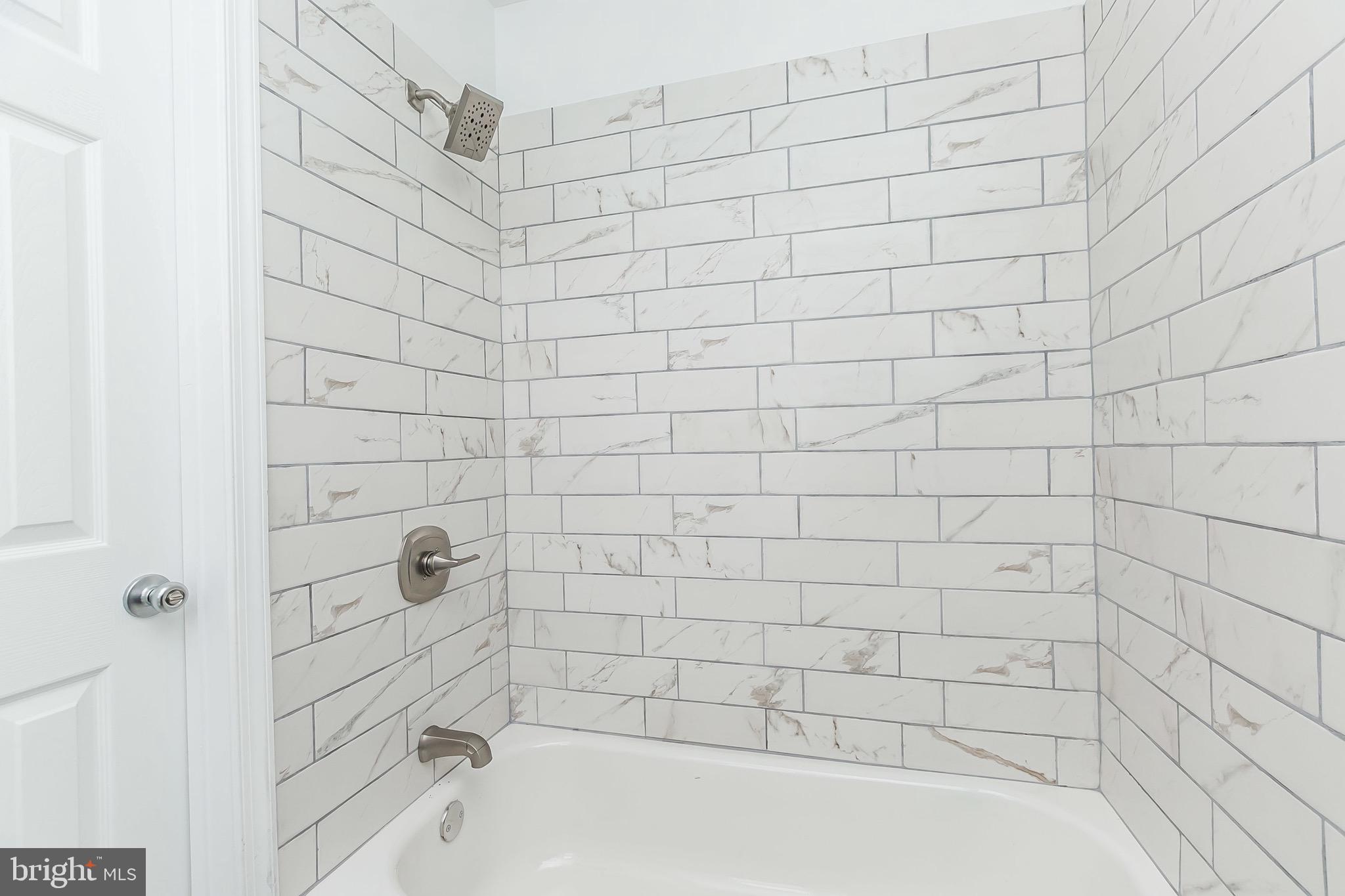 1710 Leslie Road Baltimore, MD 21222 - Photo 20 of 33 Custom tilework in shower