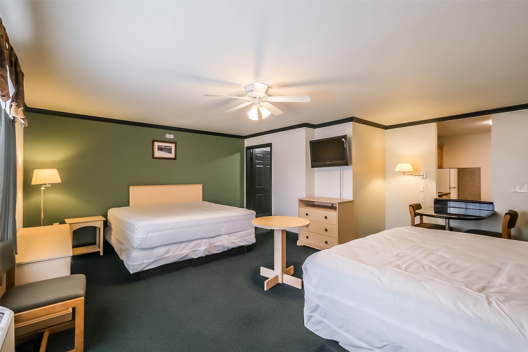 1025 Swanson Street, Unit 209 Houston, TX 77030 - Photo 13 of 19 a bedroom with a bed and a chandelier