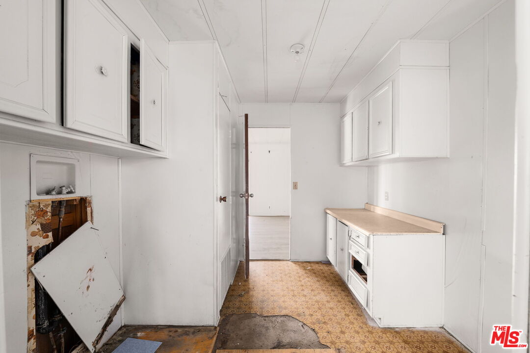 4388 Amador Road Phelan, CA 92371 - Photo 13 of 56 a view of a kitchen with a sink and dishwasher