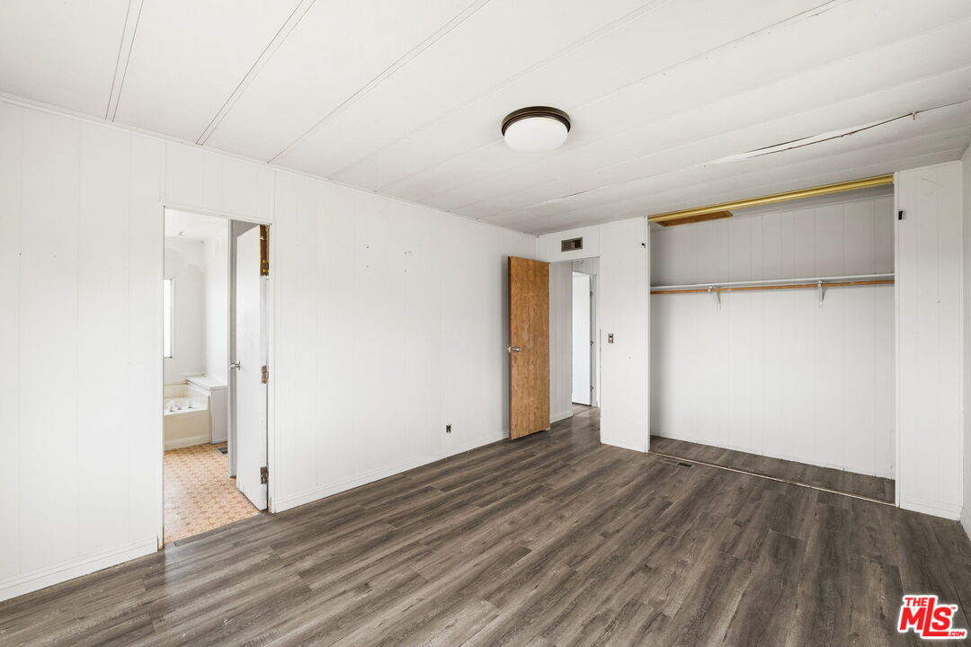 4388 Amador Road Phelan, CA 92371 - Photo 18 of 56 a view of empty room with wooden floor