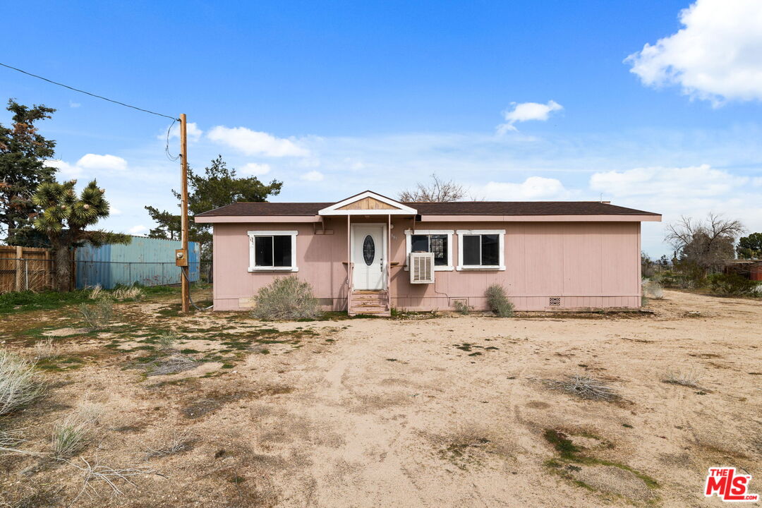 4388 Amador Road Phelan, CA 92371 - Photo 22 of 53 a front view of a house with a yard