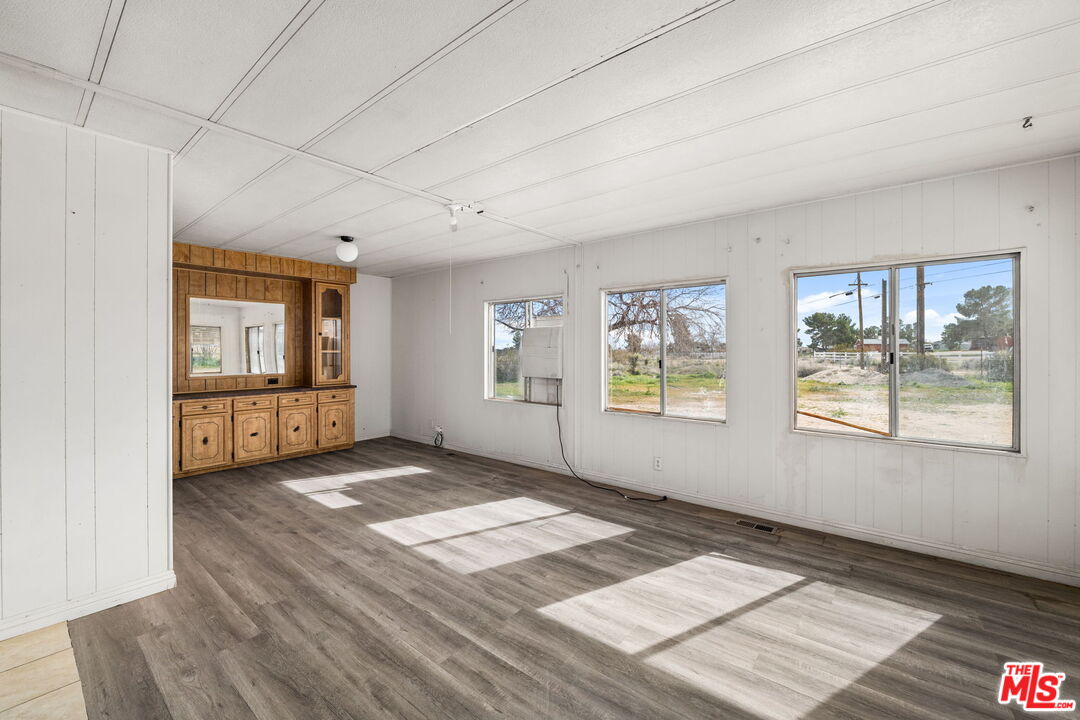 4388 Amador Road Phelan, CA 92371 - Photo 4 of 56 a view of an empty room with a window