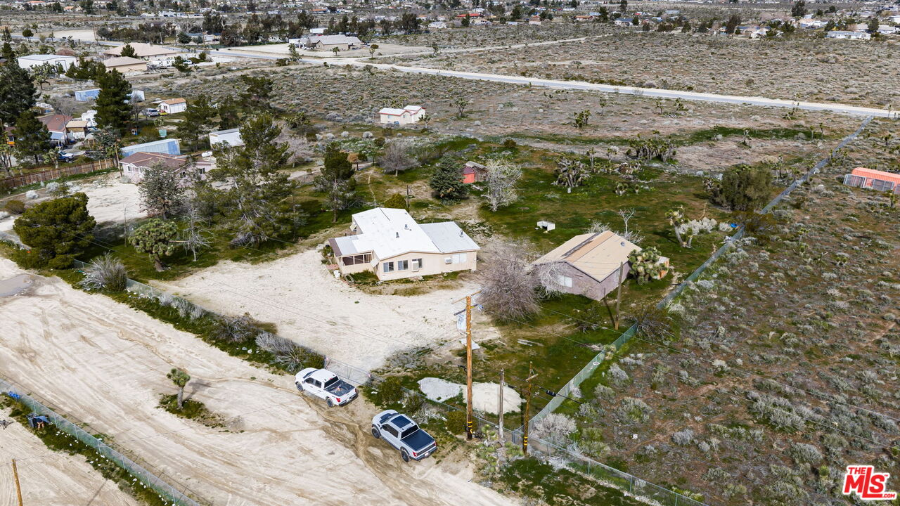 4388 Amador Road Phelan, CA 92371 - Photo 45 of 56 an aerial view of a house with a yard