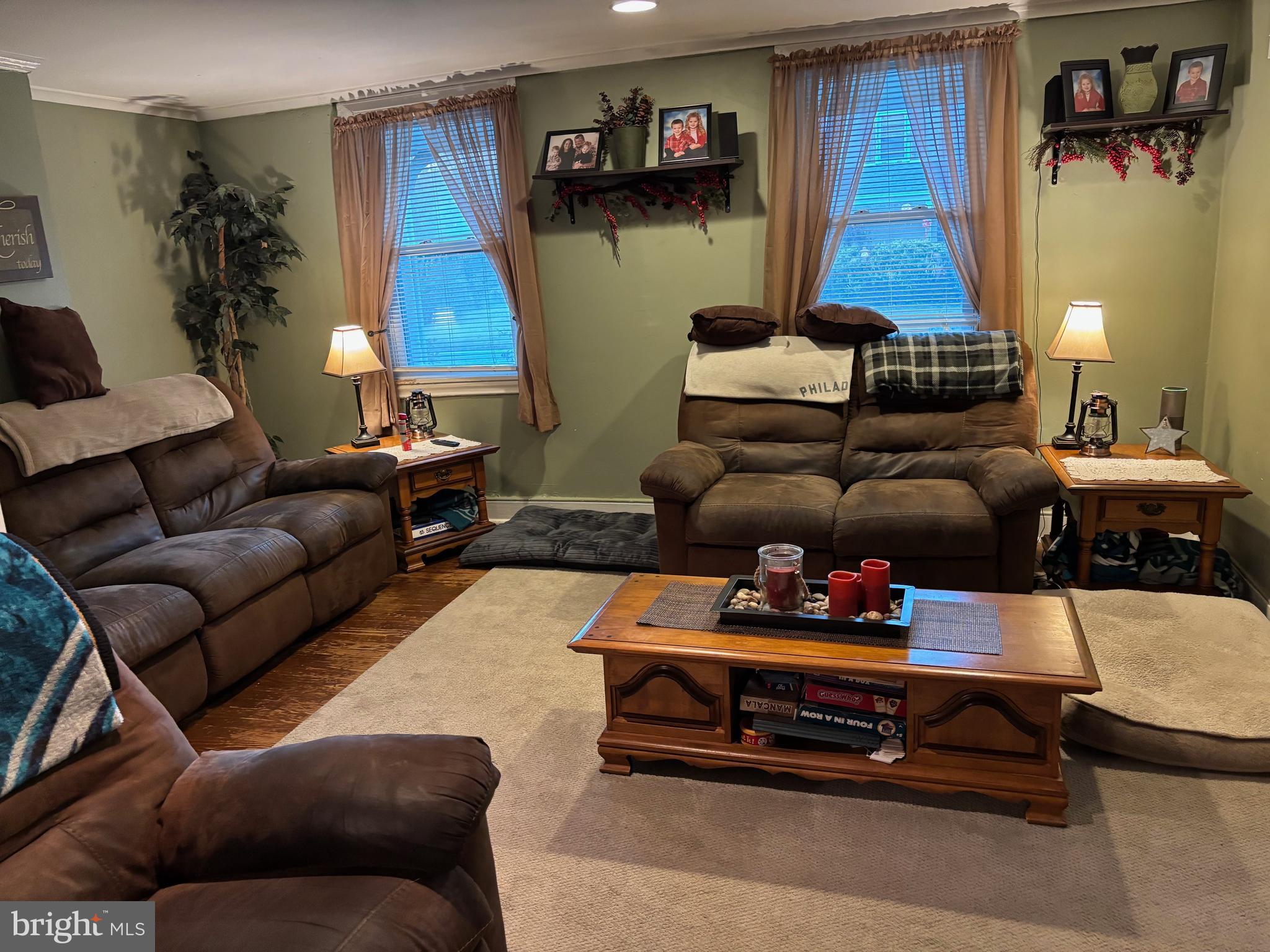 70 Main Street Waretown, NJ 08758 - Photo 14 of 54 a living room with furniture and a couch
