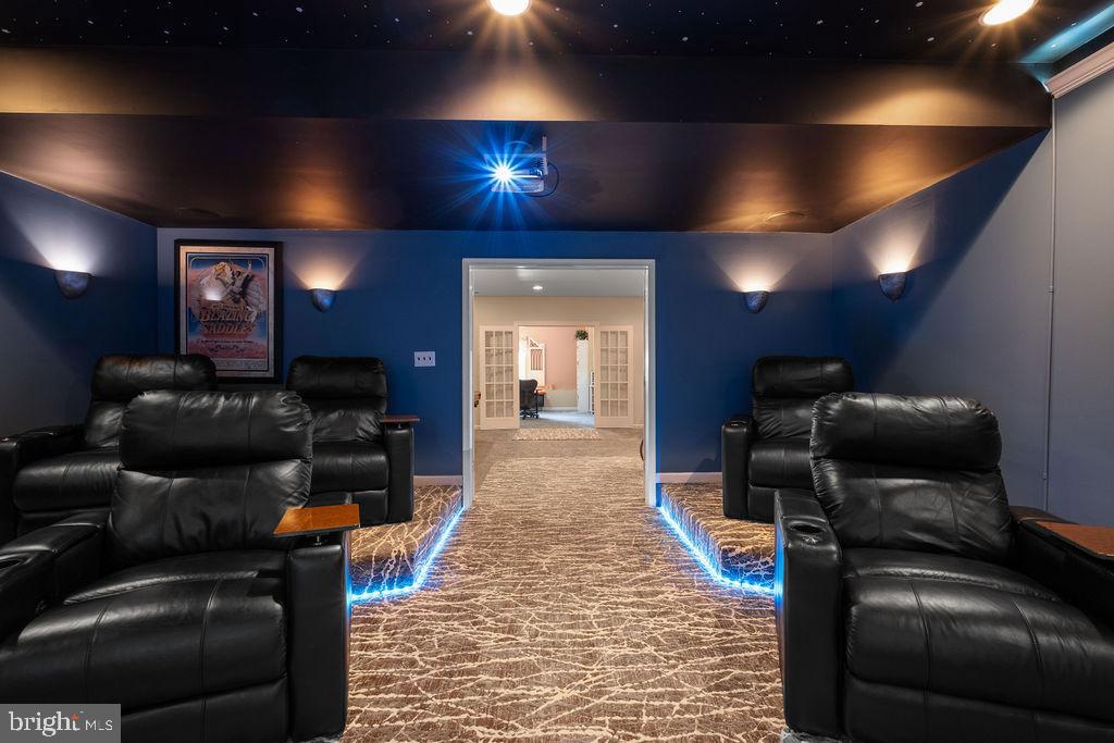 7609 Baileys Road Spotsylvania, VA 22551 - Photo 101 of 111 a living room with furniture and a flat screen tv