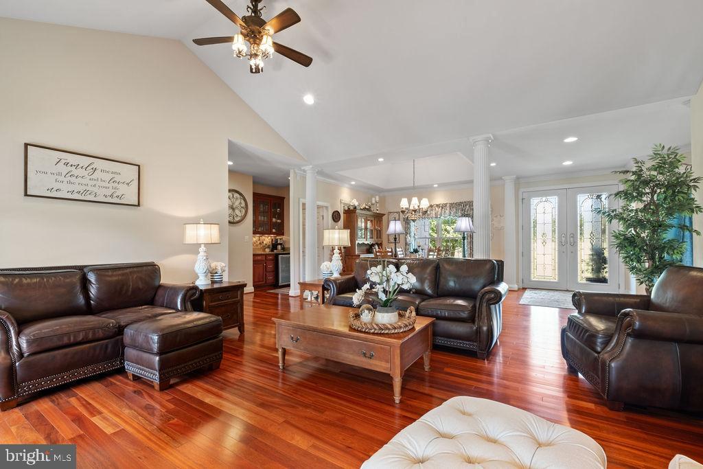 7609 Baileys Road Spotsylvania, VA 22551 - Photo 14 of 111 a living room with furniture ceiling fan and a rug