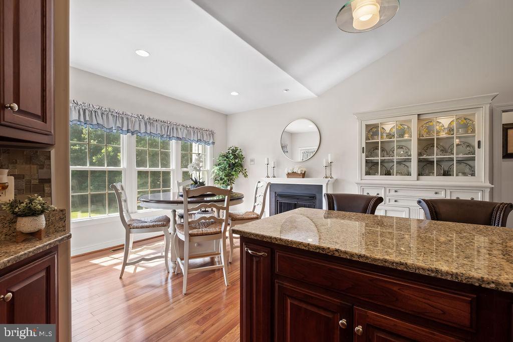 7609 Baileys Road Spotsylvania, VA 22551 - Photo 21 of 111 a living room with fireplace furniture and a large window