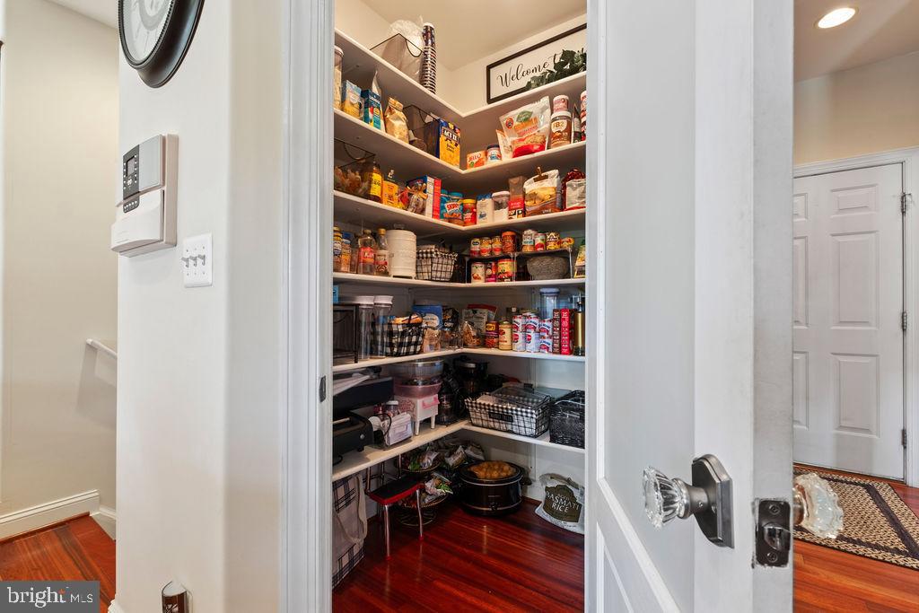 7609 Baileys Road Spotsylvania, VA 22551 - Photo 22 of 111 a view of walk in closet with clothes and shoes