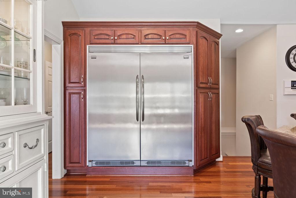 7609 Baileys Road Spotsylvania, VA 22551 - Photo 23 of 111 a view of a hallway with wooden floor