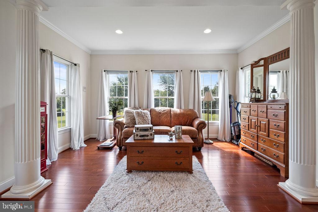 7609 Baileys Road Spotsylvania, VA 22551 - Photo 47 of 111 a living room with furniture and a wooden floor