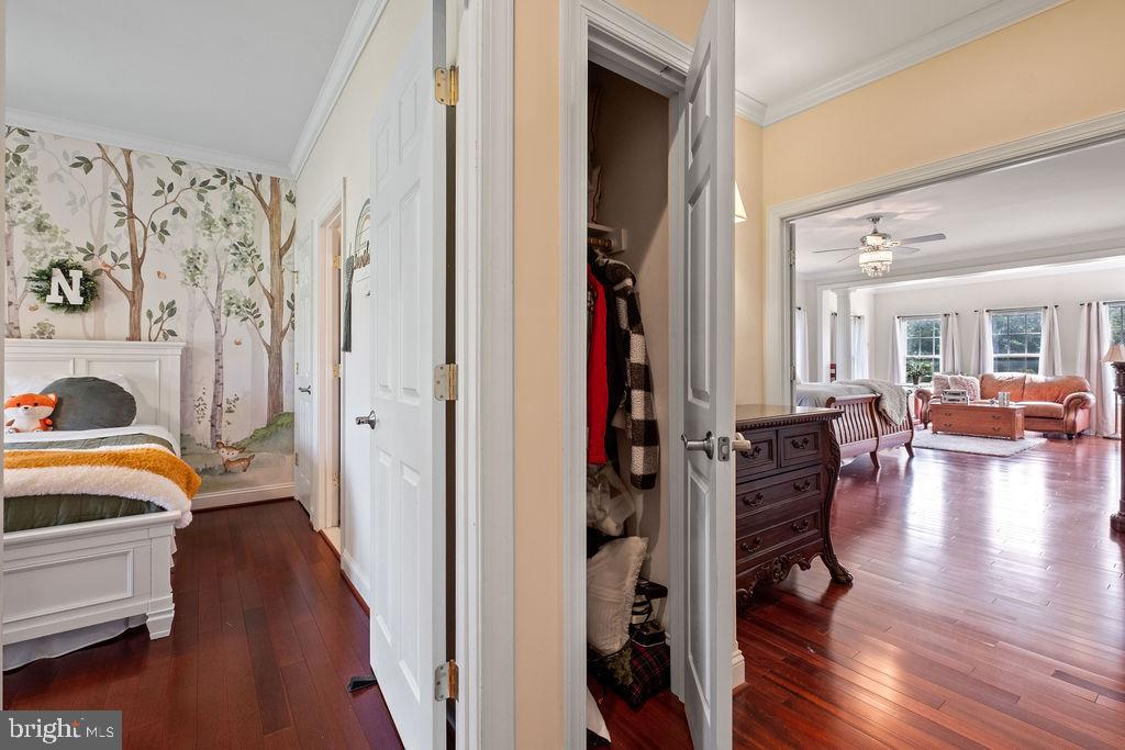 7609 Baileys Road Spotsylvania, VA 22551 - Photo 55 of 111 a view of a bedroom with furniture and wooden floor