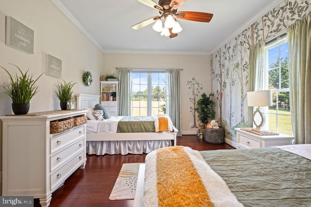 7609 Baileys Road Spotsylvania, VA 22551 - Photo 58 of 111 a bedroom with furniture and a large window