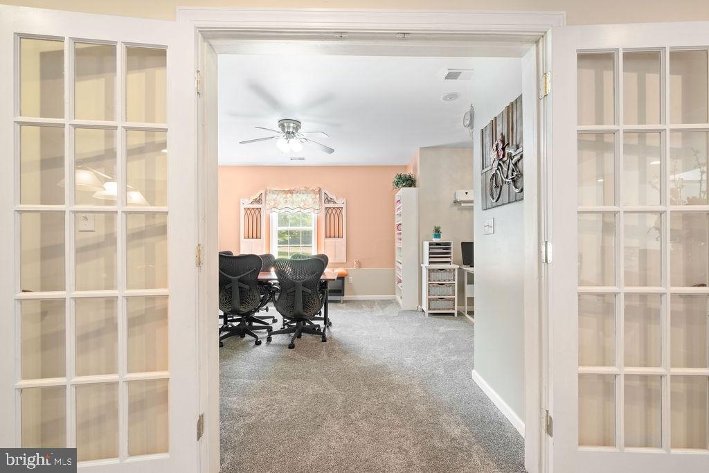 7609 Baileys Road Spotsylvania, VA 22551 - Photo 72 of 111 a view of a livingroom with workspace and a window