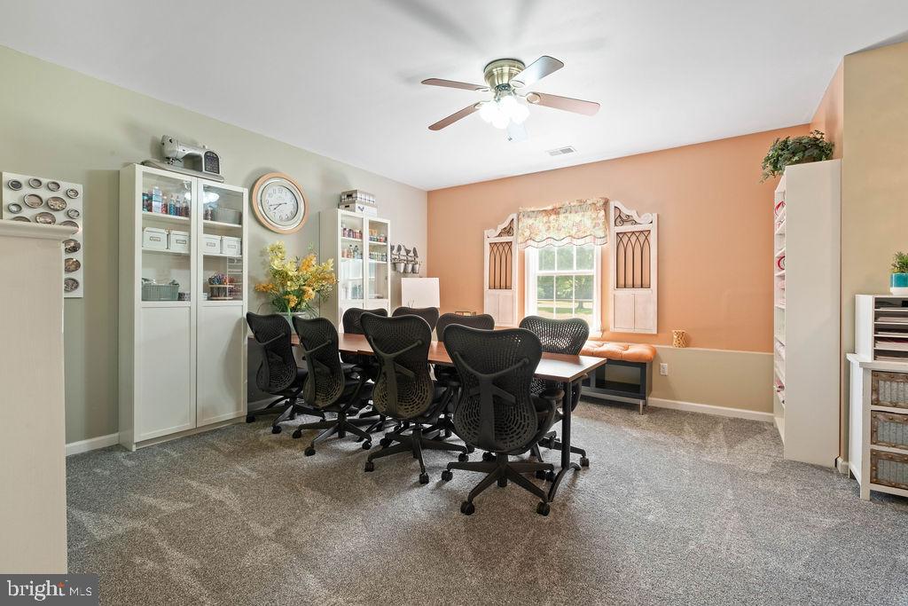 7609 Baileys Road Spotsylvania, VA 22551 - Photo 73 of 111 a living room with furniture and a large window