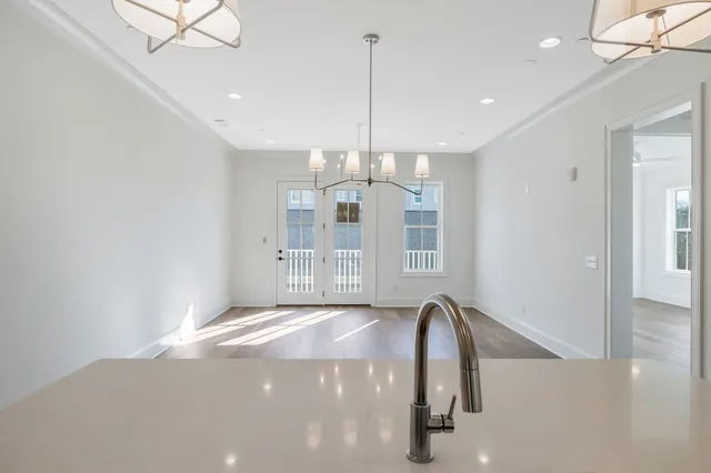 a view of a kitchen with a chandelier