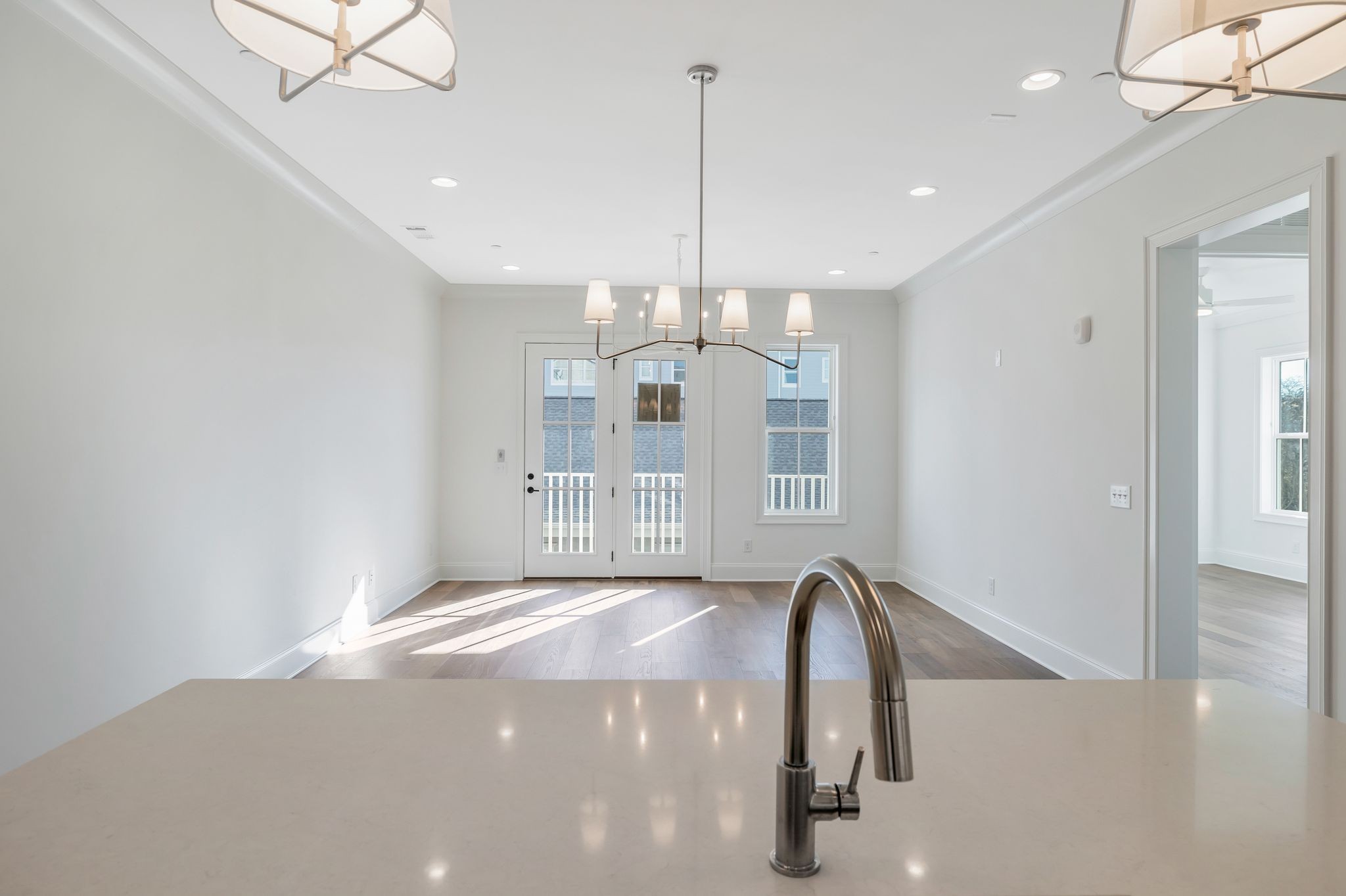 6037 Whitman Road, Unit 203 Franklin, TN 37064 - Photo 18 of 52 a view of a kitchen with a chandelier