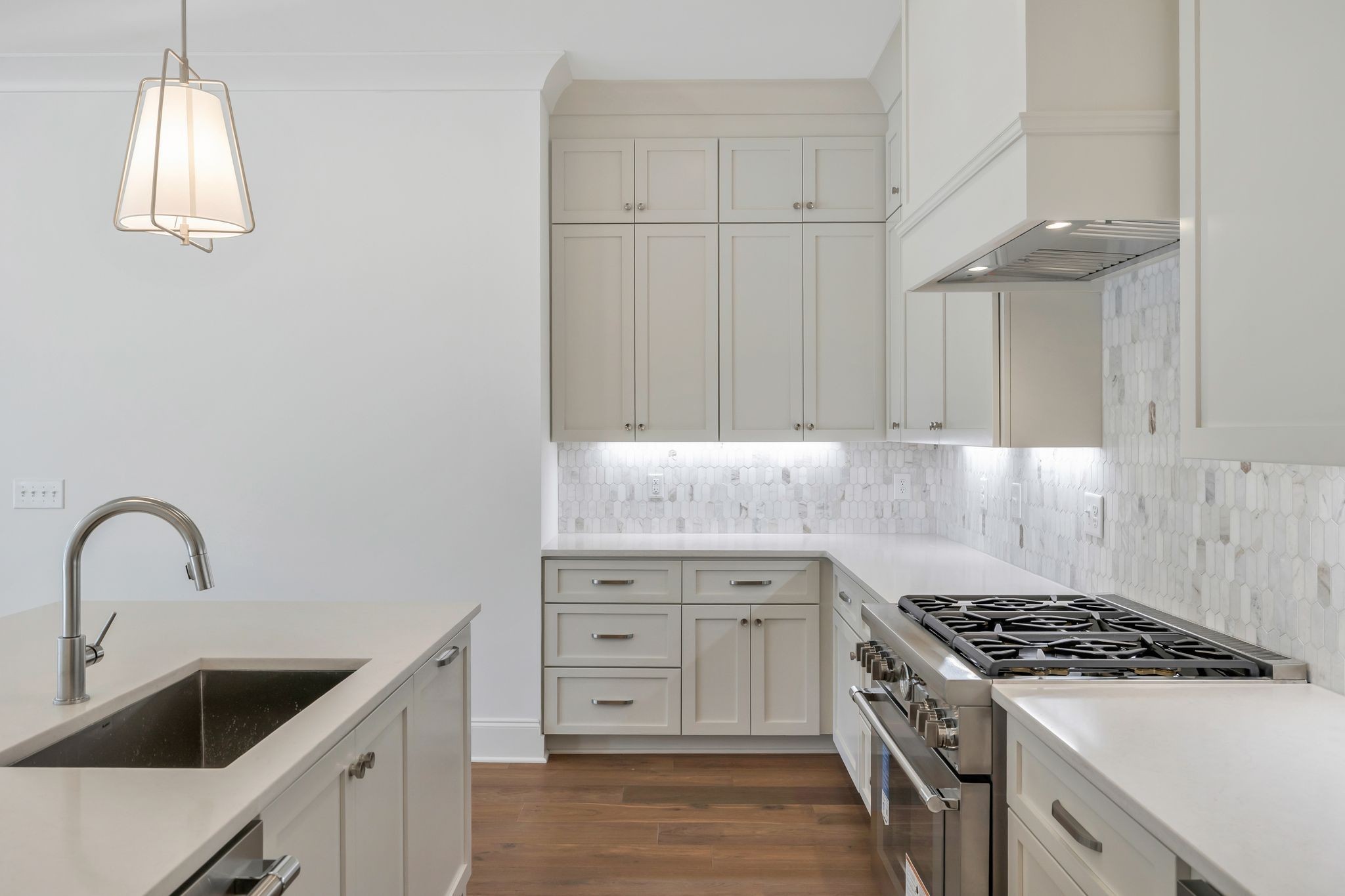 6037 Whitman Road, Unit 203 Franklin, TN 37064 - Photo 19 of 52 a kitchen with granite countertop a sink stainless steel appliances and cabinets