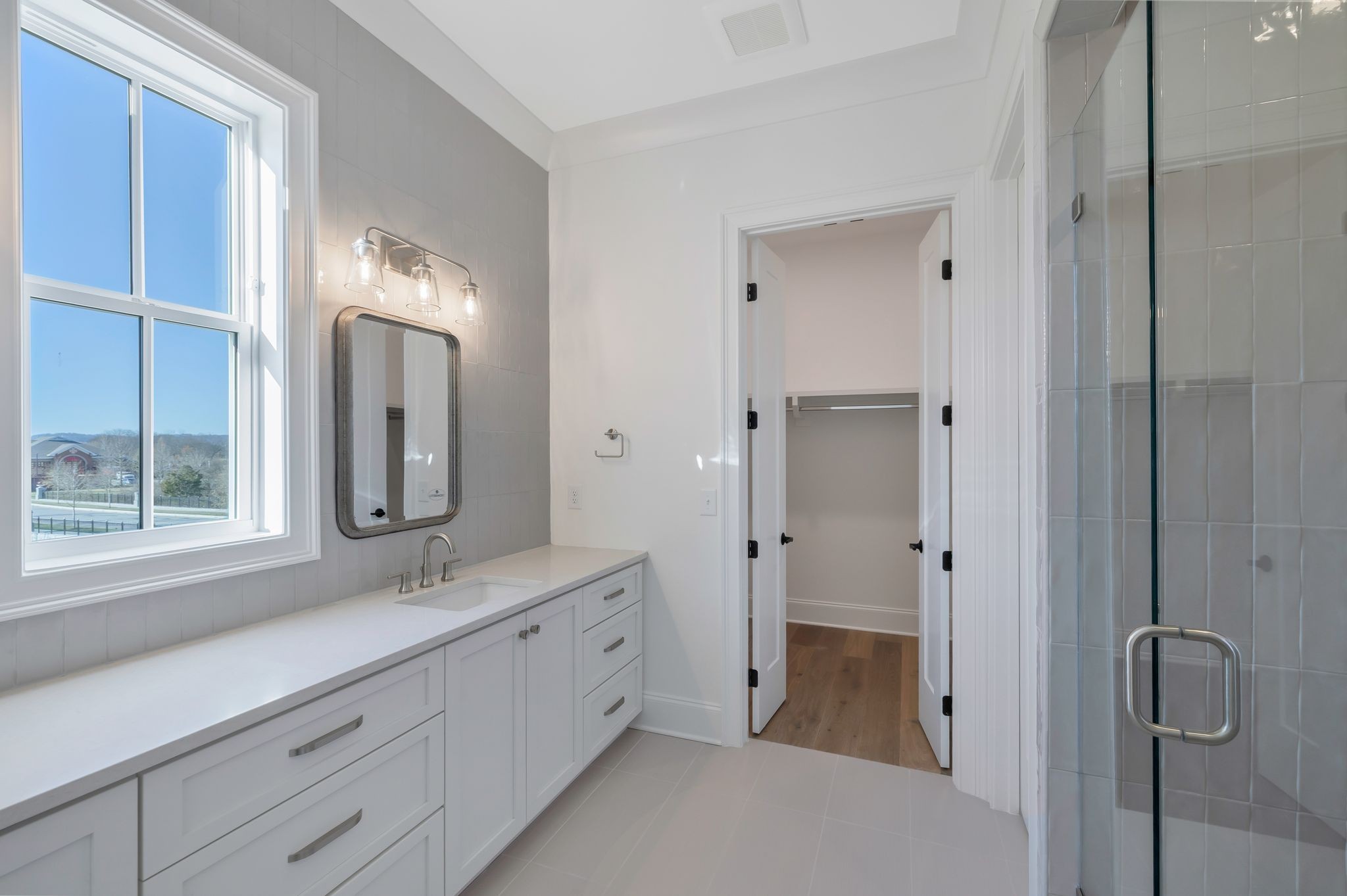 6037 Whitman Road, Unit 203 Franklin, TN 37064 - Photo 29 of 52 a bathroom with a double vanity sink mirror and double