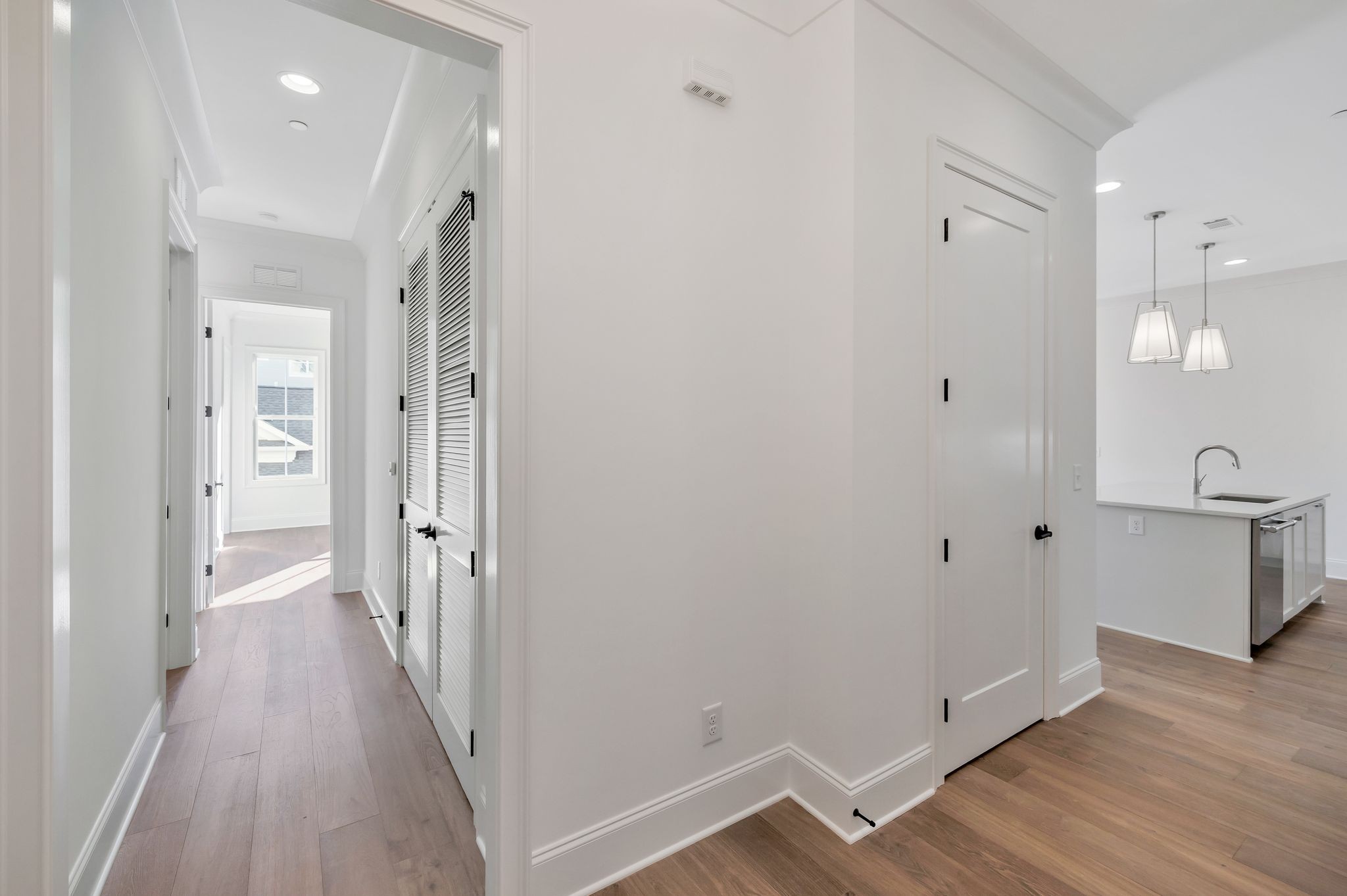 6037 Whitman Road, Unit 203 Franklin, TN 37064 - Photo 30 of 52 a view of a hallway with wooden floor