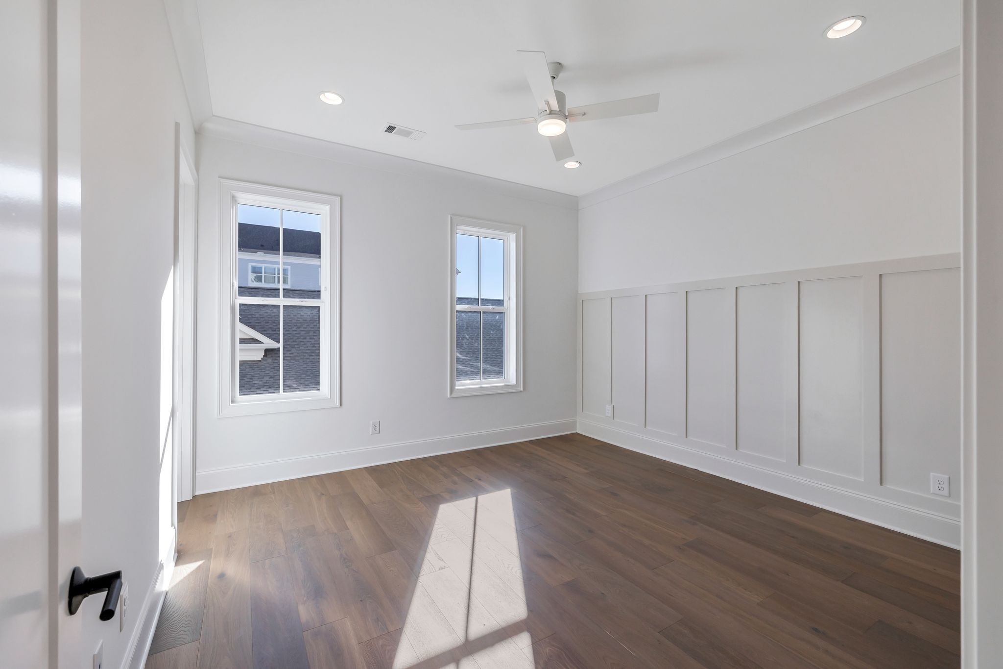 6037 Whitman Road, Unit 203 Franklin, TN 37064 - Photo 32 of 52 a view of an empty room with wooden floor and a window