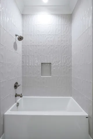 a bathroom with a bathtub
